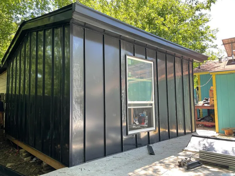 Black standing seam metal wall panels for Roof Inspection in Kings Grant